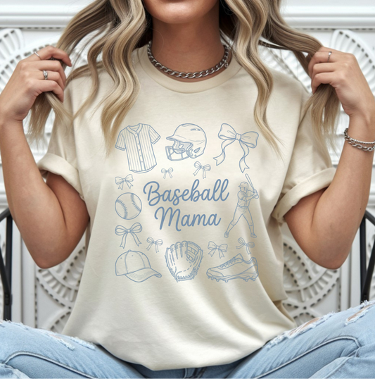 Woman wearing a 'Baseball Mama' t-shirt with sports-themed graphics.